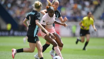 Jun 8, 2024; Harrison, New Jersey, USA; Angel City FC forward Messiah Bright (24) controls the ball against NJ/NY Gotham FC midfielder Jenna Nighswonger (2) and midfielder Maitane Lopez (77) during the second half at Red Bull Arena. Mandatory Credit: Jonathan Jones-USA TODAY Sports
