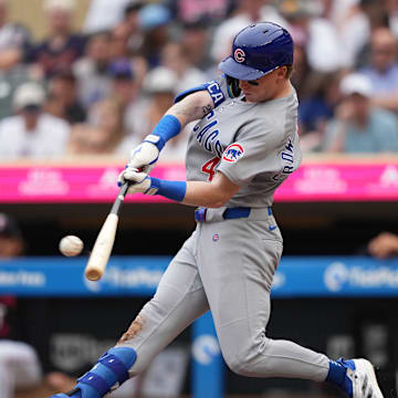 Minneapolis, Minnesota, USA; Chicago Cubs center fielder Pete Crow-Armstrong (4) hits a solo home run during the seventh inning against the Minnesota Twins at Target Field.