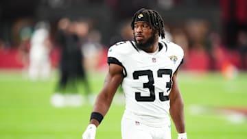 Nov 23, 2025; Glendale, Arizona, USA; Jacksonville Jaguars running back Bhayshul Tuten (33) looks on before the game against the Arizona Cardinals at State Farm Stadium.