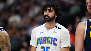 Feb 6, 2025; Denver, Colorado, USA; Orlando Magic center Goga Bitadze (35) reacts in the second half against the Orlando Magic at Ball Arena. Mandatory Credit: Ron Chenoy-Imagn Images