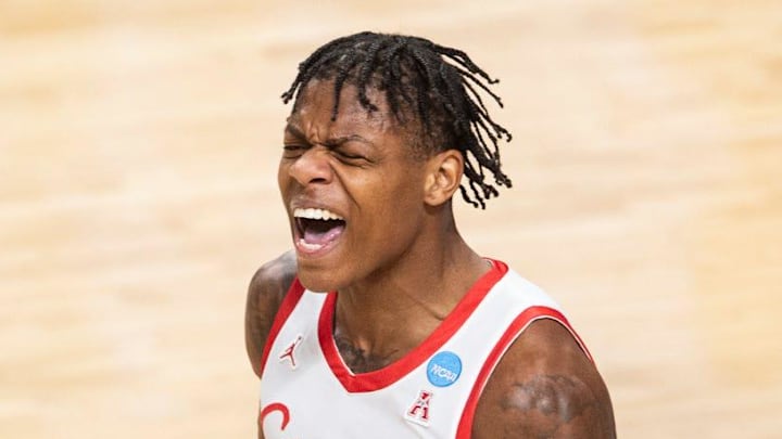 Houston Cougars guard Marcus Sasser (0) celebrates a score as Auburn Tigers take on Houston Cougars in the second round of NCAA Tournament at Legacy Arena in Birmingham, Ala., on Saturday, March 18, 2023. Houston Cougars defeated Auburn Tigers 81-64.