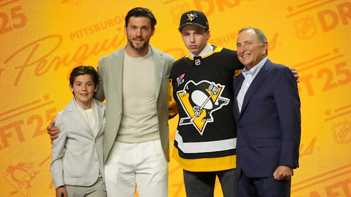Jun 27, 2025; Los Angeles, California, USA; Benjamin Kindel is selected as the 11th overall pick to the Pittsburgh Penguins in the first round of the 2025 NHL Draft at Peacock Theater. Mandatory Credit: Kirby Lee-Imagn Images