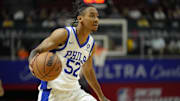 Jul 15, 2024; Las Vegas, NV, USA; Philadelphia 76ers guard Judah Mintz (52) dribbles the ball against the Portland Trail Blazers during the second half at Thomas & Mack Center. Mandatory Credit: Lucas Peltier-Imagn Images