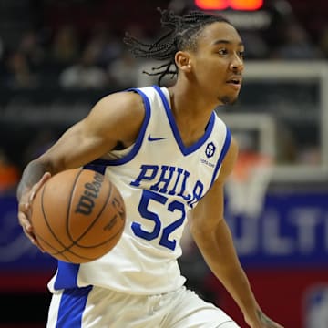 Jul 15, 2024; Las Vegas, NV, USA; Philadelphia 76ers guard Judah Mintz (52) dribbles the ball against the Portland Trail Blazers during the second half at Thomas & Mack Center. Mandatory Credit: Lucas Peltier-Imagn Images