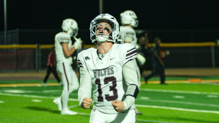 Desert Mountain quarterback Grant Garduno celebrates a scoring drive earlier earlier this season
