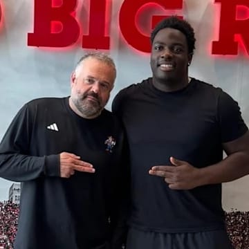 Valdin Sone with Nebraska head coach Matt Rhule.
