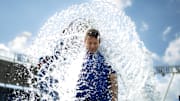 May 8, 2025; Kansas City, Missouri, USA; Kansas City Royals starting pitcher Kris Bubic (50) is doused by shortstop Bobby Witt Jr. (7) after defeating the Chicago White Sox at Kauffman Stadium. Mandatory Credit: Jay Biggerstaff-Imagn Images