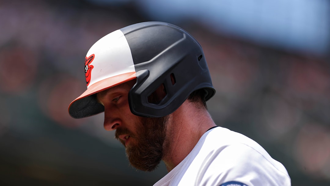 Jul 27, 2025; Baltimore, Maryland, USA; Baltimore Orioles second baseman Jordan Westburg (11) walks off the field after getting out in the first inning against the Colorado Rockies at Oriole Park at Camden Yards. Mandatory Credit: Lexi Thompson-Imagn Images