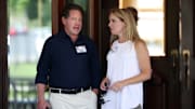 Bobby Kotick, left, has asked Activision Blizzard's board of directors to significantly reduce his salary temporarily.