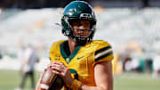 Oct 4, 2025; Waco, Texas, USA; Baylor Bears quarterback Sawyer Robertson (13) warms up before the game against the Kansas State Wildcats at McLane Stadium. Mandatory Credit: Chris Jones-Imagn Images