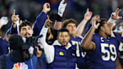 Notre Dame head coach Marcus Freeman celebrates with his players after winning a NCAA football game 70-7 against Syracuse at Notre Dame Stadium on Saturday, Nov. 22, 2025, in South Bend.