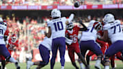 Nov 22, 2025; Houston, Texas, USA; TCU Horned Frogs quarterback Josh Hoover (10) passes the ball during the first quarter against the Houston Cougars at TDECU Stadium. Mandatory Credit: Troy Taormina-Imagn Images