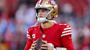 Dec 30, 2024; Santa Clara, California, USA; San Francisco 49ers quarterback Brock Purdy (13) warms up before the game against the Detroit Lions at Levi's Stadium. Mandatory Credit: Sergio Estrada-Imagn Images