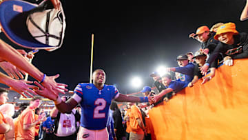 Oct 19, 2024; Gainesville, Florida, USA; Florida Gators quarterback DJ Lagway (2) shakes hands while entering the locker room after a game against the Kentucky Wildcats at Ben Hill Griffin Stadium. Mandatory Credit: Matt Pendleton-Imagn Images