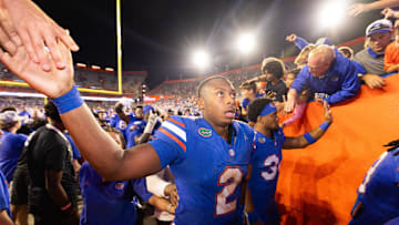 Florida Gators quarterback DJ Lagway (2) shakes hands with fans during the second half at Ben Hill Griffin Stadium in Gainesville, FL on Saturday, November 16, 2024. The Gators defeated the Tigers 27-16. [Doug Engle/Gainesville Sun]