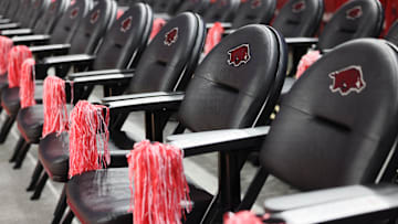 Jan 11, 2025; Fayetteville, Arkansas, USA; Arkansas Razorbacks front row seats prior to the game against the Florida Gators at Bud Walton Arena. Mandatory Credit: Nelson Chenault-Imagn Images