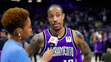 Jan 22, 2025; Sacramento, California, USA; Sacramento Kings forward DeMar DeRozan (10) is interviewed by the media after the game against the Golden State Warriors at Golden 1 Center. Mandatory Credit: Sergio Estrada-Imagn Images
