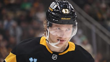 Mar 15, 2025; Pittsburgh, Pennsylvania, USA;  Pittsburgh Penguins left wing Danton Heinen (43) looks on against the New Jersey Devils during the second period at PPG Paints Arena. Mandatory Credit: Charles LeClaire-Imagn Images