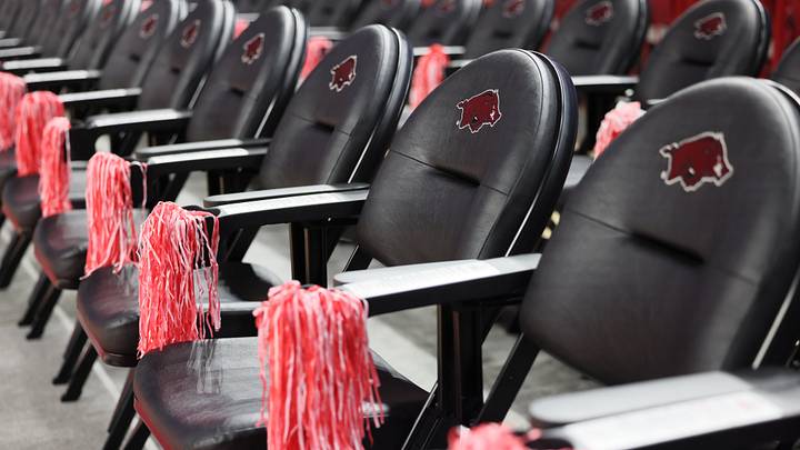 Jan 11, 2025; Fayetteville, Arkansas, USA; Arkansas Razorbacks front row seats prior to the game against the Florida Gators at Bud Walton Arena. Mandatory Credit: Nelson Chenault-Imagn Images