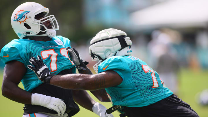 Miami Dolphins offensive tackle Terron Armstead (72) works out with offensive tackle Kion Smith (71) during a joint practice with the Atlanta Falcons at Baptist Health Training Complex.