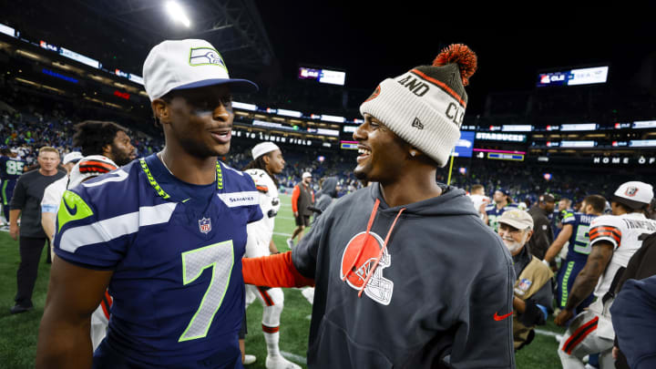 Aug 24, 2024; Seattle, Washington, USA; Seattle Seahawks quarterback Geno Smith (7) greets Cleveland Browns quarterback Deshaun Watson (4) following the fourth quarter at Lumen Field. Mandatory Credit: Joe Nicholson-USA TODAY Sports