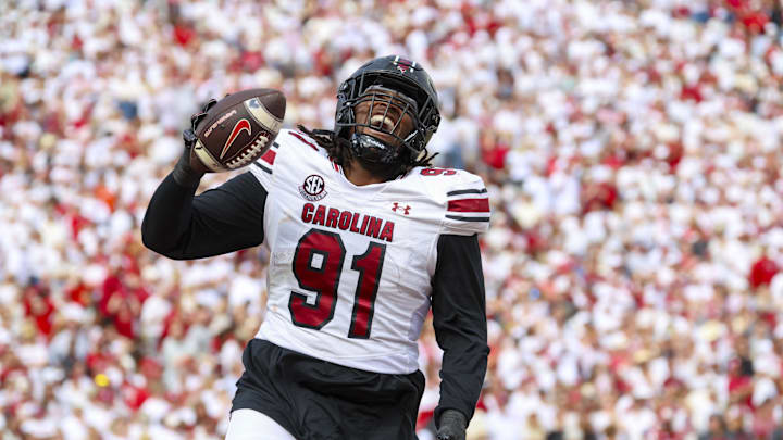 Oct 19, 2024; Norman, Oklahoma, USA;  South Carolina Gamecocks defensive tackle Tonka Hemingway (91) reacts after returning a fumble for a touchdown during the first half against the Oklahoma Sooners at Gaylord Family-Oklahoma Memorial Stadium. Mandatory Credit: Kevin Jairaj-Imagn Images