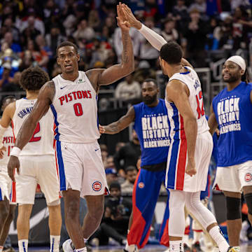 Detroit Pistons center Duren celebrates with forward Harris on a time out during the second half against the LA Clippers at Little Caesars Arena. 