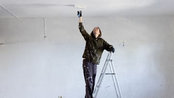 This painting hack could have helped keep her clothes splatter-free.