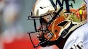Wake Forest's Bryce Ganious (55) prepares before taking on the NC State Wolfpack in their 2024 outing. Ganious and the Demon Deacons would defeat the Wolfpack, 34-30, after a last-minute touchdown.