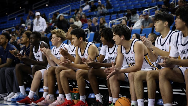 Crean Lutheran players look on as the Saints take on Campbell Hall at Pauley Pavilion.
