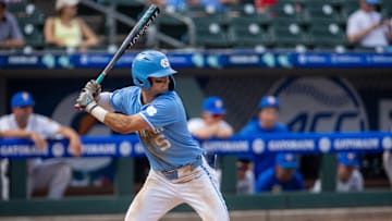 May 23, 2024; Charlotte, NC, USA; North Carolina Tar Heels infielder Gavin Gallaher (5) at bat in the seventh inning against the Pittsburgh Panthers during the ACC Baseball Tournament at Truist Field. Mandatory Credit: Scott Kinser-Imagn Images
