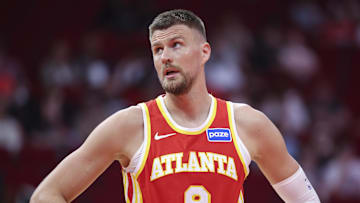 Atlanta Hawks center Kristaps Porzingis (8) reacts during the second quarter against the Houston Rockets at Toyota Center.