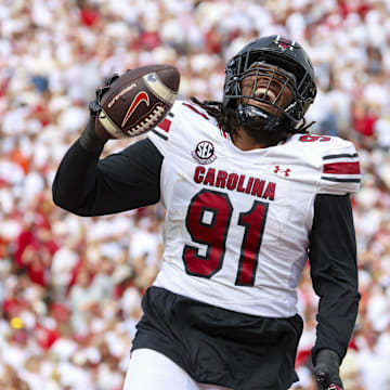 Oct 19, 2024; Norman, Oklahoma, USA;  South Carolina Gamecocks defensive tackle Tonka Hemingway (91) reacts after returning a fumble for a touchdown during the first half against the Oklahoma Sooners at Gaylord Family-Oklahoma Memorial Stadium. Mandatory Credit: Kevin Jairaj-Imagn Images