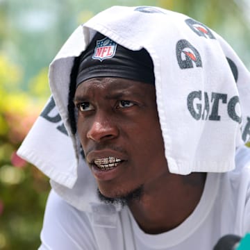 Miami Dolphins cornerback Cam Smith (24) speaks to reporters after practicing during mandatory minicamp at Hard Rock Stadium. 