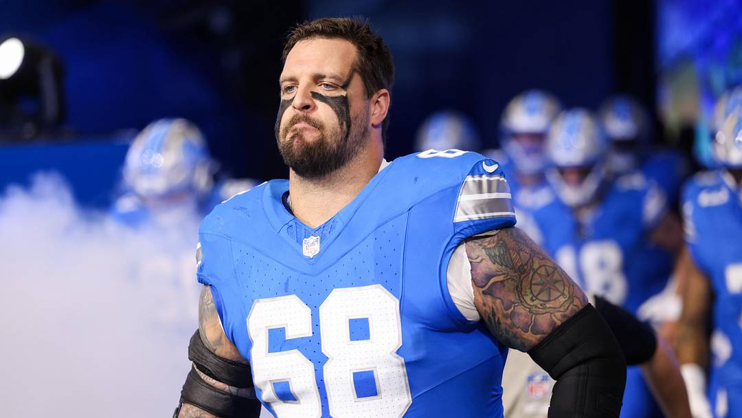 Nov 2, 2025; Detroit, Michigan, USA; Detroit Lions tackle Taylor Decker (68) enters the field before the game against the Minnesota Vikings at Ford Field. Mandatory Credit: David Reginek-Imagn Images