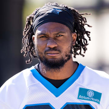 Jul 23, 2025; Charlotte, NC, USA; Carolina Panthers cornerback M.J. Devonshire (28) heads to the field for training camp. Mandatory Credit: Scott Kinser-Imagn Images