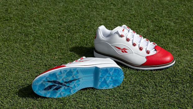 White and red Reebok golf shoes.