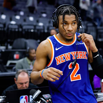 Mar 10, 2025; Sacramento, California, USA; New York Knicks guard Miles McBride (2) is interviewed by media after the game against the Sacramento Kings at Golden 1 Center. Mandatory Credit: Sergio Estrada-Imagn Images