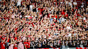 Aug 28, 2025; Raleigh, North Carolina, USA; North Carolina State Wolfpack fans react to a down during the second half of the game against East Carolina Pirates at Carter-Finley Stadium. Mandatory Credit: Jaylynn Nash-Imagn Images