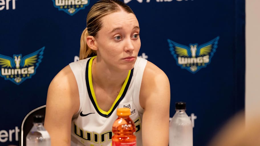 Dallas Wings rookie Paige Bueckers talks to media after a game. | Gatorade