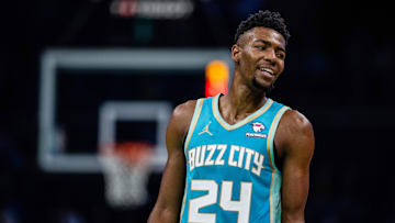Apr 7, 2024; Charlotte, North Carolina, USA; Charlotte Hornets forward Brandon Miller (24) looks on during the second quarter against the Oklahoma City Thunder at Spectrum Center. Mandatory Credit: Scott Kinser-Imagn Images