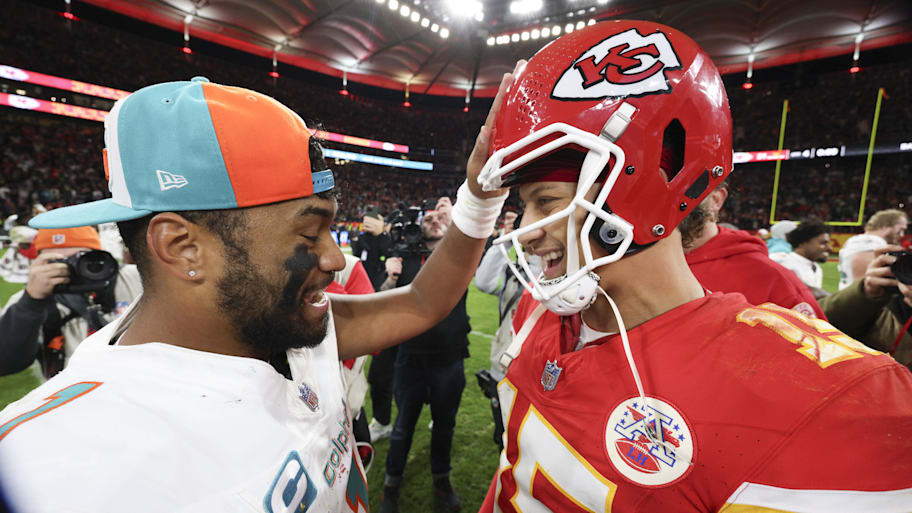 Kansas City Chiefs quarterback Patrick Mahomes (15) greets Miami Dolphins quarterback Tua Tagovailoa (1) after an NFL International Series game at Deutsche Bank Park in 2023. | Nathan Ray Seebeck-Imagn Images