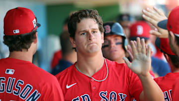 Boston Red Sox outfielder Roman Anthony (48) is congratulated after he scored a run against the Philadelphia Phillies  during the third inning  at BayCare Ballpark. 