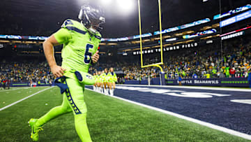 Dec 15, 2024; Seattle, Washington, USA; Seattle Seahawks quarterback Sam Howell (6) jogs to the locker room following a loss against the Green Bay Packers at Lumen Field. Mandatory Credit: Joe Nicholson-Imagn Images