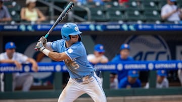 May 23, 2024; Charlotte, NC, USA; North Carolina Tar Heels infielder Gavin Gallaher (5) at bat in the seventh inning against the Pittsburgh Panthers during the ACC Baseball Tournament at Truist Field. Mandatory Credit: Scott Kinser-Imagn Images
