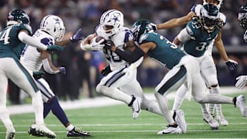 Dec 10, 2023; Arlington, Texas, USA; Dallas Cowboys running back Tony Pollard (20) is tackled by Philadelphia Eagles safety Kevin Byard (31) in the game at AT&T Stadium. Mandatory Credit: Tim Heitman-Imagn Images