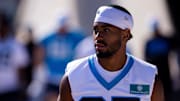 Jul 23, 2025; Charlotte, NC, USA; Carolina Panthers cornerback Mike Reid (35) walks to the field for training camp.
