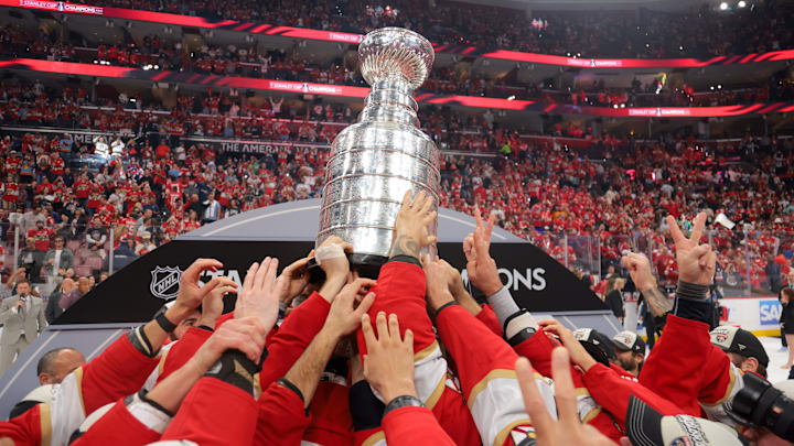 Jun 17, 2025; Sunrise, Florida, USA; The Florida Panthers hoist the Stanley Cup after winning game six of the 2025 Stanley Cup Final against the Edmonton Oilers at Amerant Bank Arena. Mandatory Credit: Sam Navarro-Imagn Images Jun 17, 2025; Sunrise, Florida, USA; The Florida Panthers hoist the Stanley Cup after winning game six of the 2025 Stanley Cup Final against the Edmonton Oilers at Amerant Bank Arena. Mandatory Credit: Sam Navarro-Imagn Images