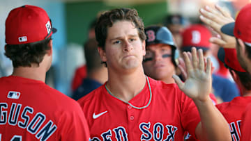 Feb 28, 2025; Clearwater, Florida, USA; Boston Red Sox outfielder Roman Anthony (48) is congratulated after he scored a run against the Philadelphia Phillies  during the third inning  at BayCare Ballpark. Mandatory Credit: Kim Klement Neitzel-Imagn Images