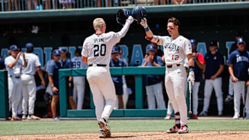 Jun 7, 2025; Chapel Hill, NC, USA; Arizona catcher Tommy Splaine (20) celebrates a home run during the third inning of the Super Regionals game against North Carolina in Chapel Hill, North Carolina. Mandatory Credit: Jaylynn Nash-Imagn Images